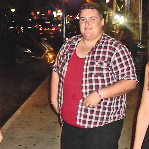 Aaron standing on street before 16st weight loss-slimming world blog