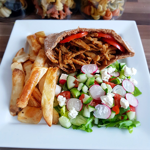 Slimming World kebab with chips and salad on white plate-slimming world's summer of love challenge