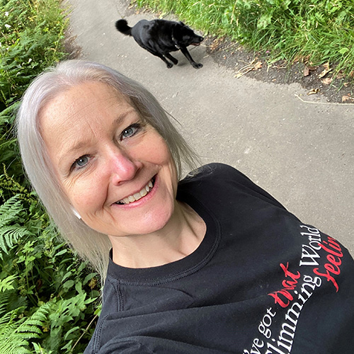Sue and black labrador walking-Slimming World's summer of love challenge