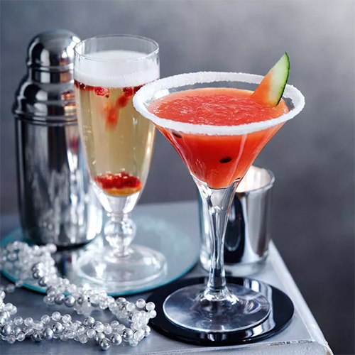 Slimming World ginger and pomegranate cocktail with a glass of champagne