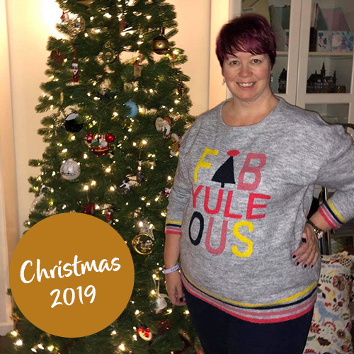 Slimming World member Kirsty before photo in front of a Christmas tree-2019