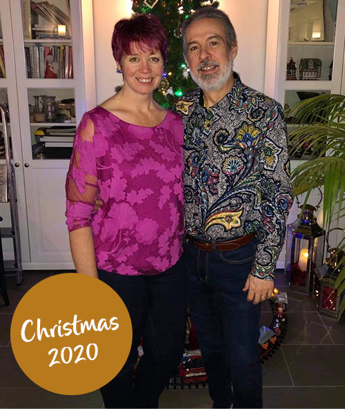 Kirsty and Roger Cound-Christmas 2020-Slimming World members in front of a Christmas tree