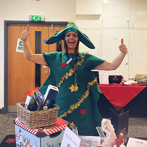 Slimming World Consultant Mel dressed as a Christmas tree