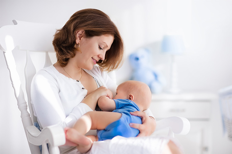 Woman breastfeeding her baby