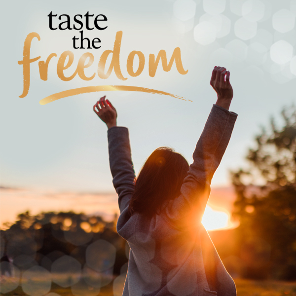 Image shows woman with arms in the air - text reads taste the freedom