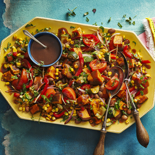 Tex-Mex sweet potato salad on a yellow serving plate
