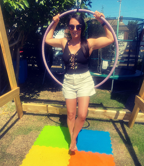 Slimming World member Hollie swinging on an aerial hoop