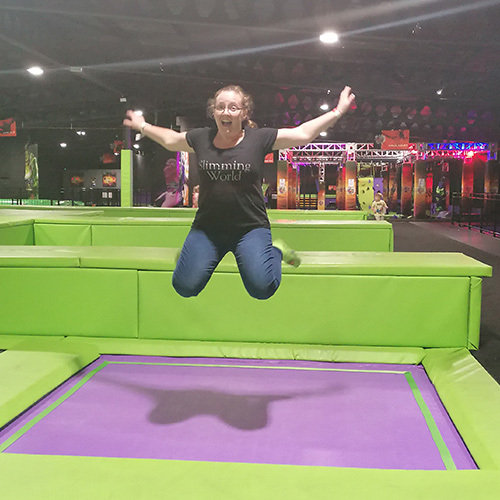 Slimming World member Aimee on a trampoline