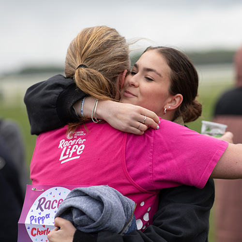 Race for Life York 2025 - runner hugging supporter