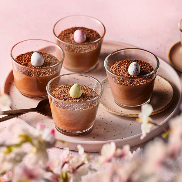 Pots of chocolate mousse with a Mini Egg on top