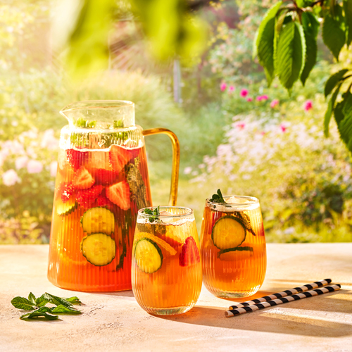 A jug and two glasses of Slimming World Pimms in the garden